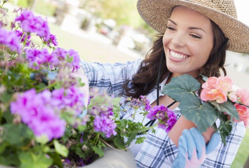 Investigator inspecting plants and soil as part of a complaint